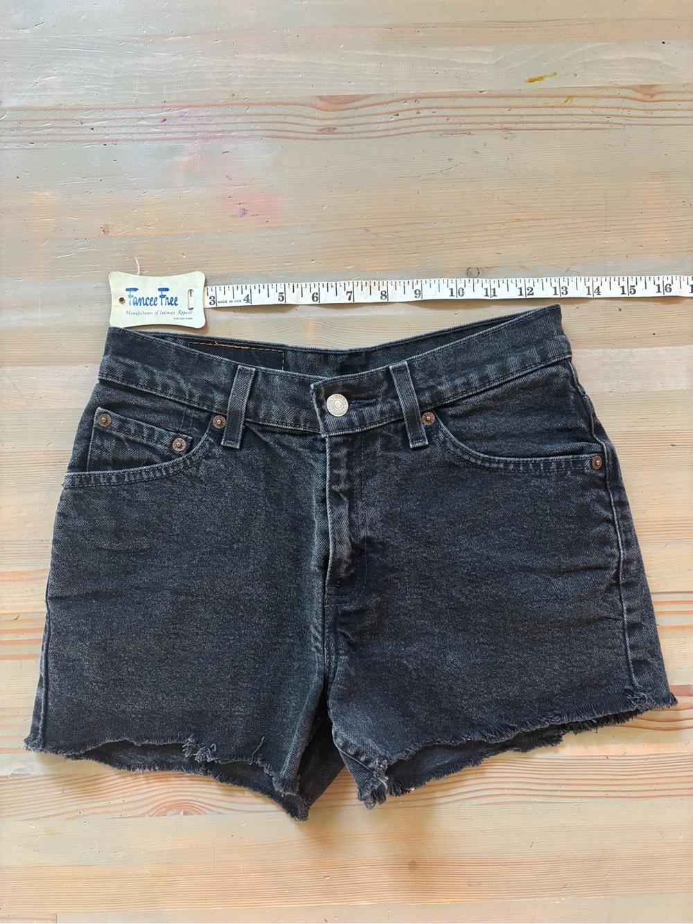 Vintage 2001 Levi's 517 Black Denim Cutoff Shorts - Size 25